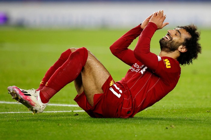 BRIGHTON, ENGLAND - JULY 08: Mohamed Salah of Liverpool reacts during the Premier League match between Brighton & Hove Albion and Liverpool FC at American Express Community Stadium on July 08, 2020 in Brighton, England. Football Stadiums around Europe remain empty due to the Coronavirus Pandemic as Government social distancing laws prohibit fans inside venues resulting in all fixtures being played behind closed doors. (Photo by Paul Childs/Pool via Getty Images)