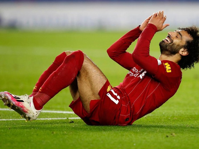 BRIGHTON, ENGLAND - JULY 08: Mohamed Salah of Liverpool reacts during the Premier League match between Brighton & Hove Albion and Liverpool FC at American Express Community Stadium on July 08, 2020 in Brighton, England. Football Stadiums around Europe remain empty due to the Coronavirus Pandemic as Government social distancing laws prohibit fans inside venues resulting in all fixtures being played behind closed doors. (Photo by Paul Childs/Pool via Getty Images)