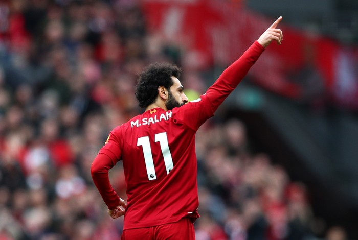 LIVERPOOL, ENGLAND - MARCH 07: Mohamed Salah of Liverpool celebrates after scoring his teams first goal during the Premier League match between Liverpool FC and AFC Bournemouth  at Anfield on March 07, 2020 in Liverpool, United Kingdom. (Photo by Jan Kruger/Getty Images)