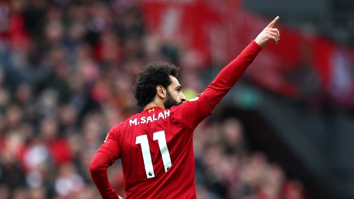 LIVERPOOL, ENGLAND - MARCH 07: Mohamed Salah of Liverpool celebrates after scoring his teams first goal during the Premier League match between Liverpool FC and AFC Bournemouth  at Anfield on March 07, 2020 in Liverpool, United Kingdom. (Photo by Jan Kruger/Getty Images)