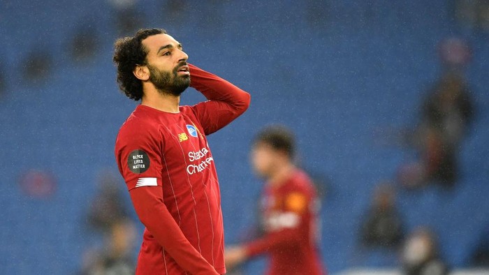 BRIGHTON, ENGLAND - JULY 08: Mohamed Salah of Liverpool reacts during the Premier League match between Brighton & Hove Albion and Liverpool FC at American Express Community Stadium on July 08, 2020 in Brighton, England. Football Stadiums around Europe remain empty due to the Coronavirus Pandemic as Government social distancing laws prohibit fans inside venues resulting in all fixtures being played behind closed doors. (Photo by Daniel Leal Olivas/Pool via Getty Images)
