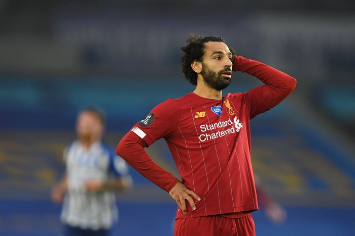 BRIGHTON, ENGLAND - JULY 08: Mohamed Salah of Liverpool reacts during the Premier League match between Brighton & Hove Albion and Liverpool FC at American Express Community Stadium on July 08, 2020 in Brighton, England. Football Stadiums around Europe remain empty due to the Coronavirus Pandemic as Government social distancing laws prohibit fans inside venues resulting in all fixtures being played behind closed doors. (Photo by Daniel Leal Olivas/Pool via Getty Images)