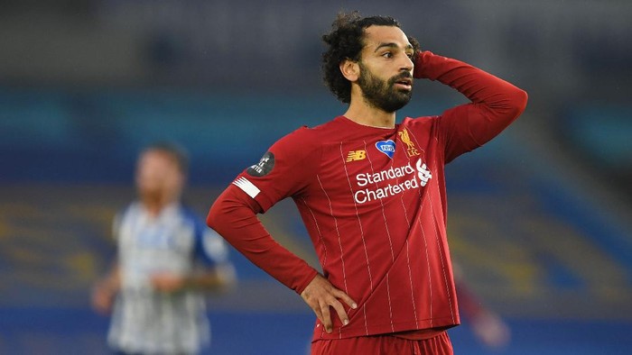 BRIGHTON, ENGLAND - JULY 08: Mohamed Salah of Liverpool reacts during the Premier League match between Brighton & Hove Albion and Liverpool FC at American Express Community Stadium on July 08, 2020 in Brighton, England. Football Stadiums around Europe remain empty due to the Coronavirus Pandemic as Government social distancing laws prohibit fans inside venues resulting in all fixtures being played behind closed doors. (Photo by Daniel Leal Olivas/Pool via Getty Images)