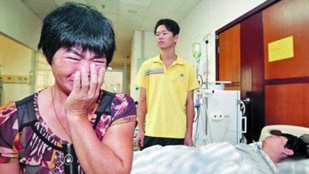 Picture shows : Lian Ronghua (left) with eldest son (centre) and younger son Li Haisong (in bed) before surgery. A Chinese woman has given her youngest son the gift of life while potentially leaving her oldest child to die after being forced to make a Sophie's choice like decision over which of them to help.In the film Sophie's choice Meryl Streep stars as Sophie, a Polish immigrant that has to make the decision over which of her children is to be sent to the gas chambers and which will be given the choice of life by being assigned to a labour detail.And now Chinese mother Lian Ronghua, 53, has been forced to make the same decision after discovering that both of her sons were fighting for their lives after suffering from kidney failure and that only a transplant could save them.Both Li Haiqing, 26, and his brother Li Haisong, 24, have gone downhill badly since suffering from the disease and have been hospitalised with medics predicting that they urgently need a kidney transplant.The family are from Quanzhou city in southeast Chinas Fujian province and both parents had instantly offered their own kidneys but the boy's father suffers from high blood pressure and doctors told him it would be impossible for him to make a donation as it could kill him.Mum Lian Ronghua had then been tested and was told she was eligible as a candidate and an almost perfect match, but that she could only donate one kidney and therefore only save the life of one of her boys.In the end the devastated woman chose the youngest son, and the operation has gone ahead to transplant the kidney from the mother to her youngest son at a hospital in Xiamen city, the capital city of southeast Chinas Fujian province.Hospital spokesman Hsin Chiu said: 