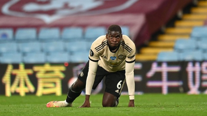 BIRMINGHAM, ENGLAND - JULY 09: Paul Pogba of Manchester United reacts during the Premier League match between Aston Villa and Manchester United at Villa Park on July 09, 2020 in Birmingham, England. Football Stadiums around Europe remain empty due to the Coronavirus Pandemic as Government social distancing laws prohibit fans inside venues resulting in all fixtures being played behind closed doors. (Photo by Shaun Botterill/Getty Images)