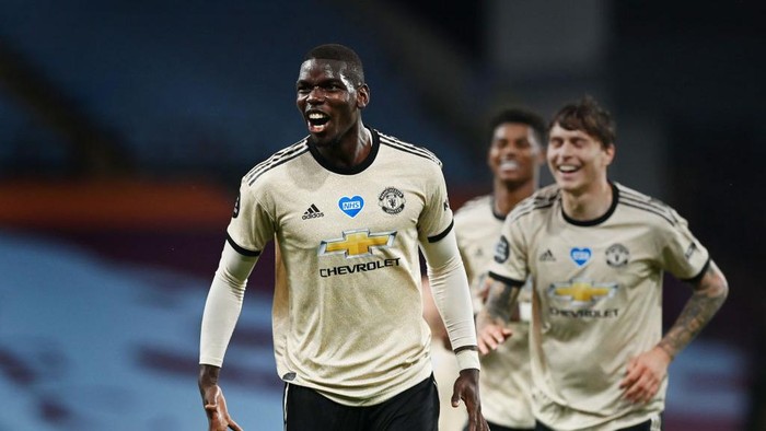 BIRMINGHAM, ENGLAND - JULY 09: Paul Pogba of Manchester United celebrates after scoring his teams third goal during the Premier League match between Aston Villa and Manchester United at Villa Park on July 09, 2020 in Birmingham, England. Football Stadiums around Europe remain empty due to the Coronavirus Pandemic as Government social distancing laws prohibit fans inside venues resulting in all fixtures being played behind closed doors. (Photo by Shaun Botterill/Getty Images)
