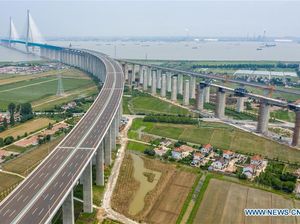 Jembatan Kabel Terpanjang di Dunia 11 Km Dibuka di China Jembatan Kabel Terpanjang di Dunia 11 Km Dibuka di China