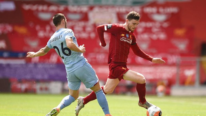 during the English Premier League soccer match between Liverpool and Burnley at Anfield in Liverpool, England, Saturday , July 11, 2020. (Phil Noble/Pool via AP)