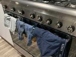 Jadi Kontroversi, Istri Jemur Pakaian Dalam Suami di Oven Saat Dipakai Masak