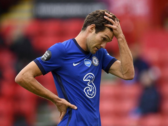SHEFFIELD, ENGLAND - JULY 11: Marcos Alonso of Chelsea reacts during the Premier League match between Sheffield United and Chelsea FC at Bramall Lane on July 11, 2020 in Sheffield, England. Football Stadiums around Europe remain empty due to the Coronavirus Pandemic as Government social distancing laws prohibit fans inside venues resulting in all fixtures being played behind closed doors. (Photo by Peter Powell/Pool via Getty Images)