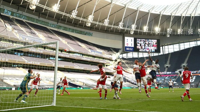 LONDON, ENGLAND - JULY 12: Toby Alderweireld of Tottenham Hotspur  scores his teams second goal  during the Premier League match between Tottenham Hotspur and Arsenal FC at Tottenham Hotspur Stadium on July 12, 2020 in London, England. Football Stadiums around Europe remain empty due to the Coronavirus Pandemic as Government social distancing laws prohibit fans inside venues resulting in all fixtures being played behind closed doors. (Photo by Julian Finney/Getty Images)