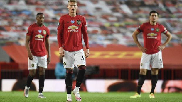 Manchester United's Scott McTominay reacts after the English Premier League soccer match between Manchester United and Southampton at Old Trafford in Manchester, England, Monday, July 13, 2020. (AP Photo/Peter Powell,Pool)