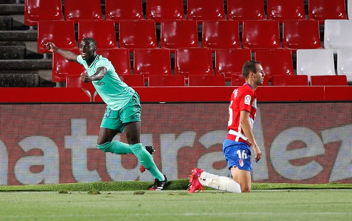 GRANADA, SPAIN - JULY 13:  Ferland Mendy of Real Madrid celebrates scoring the opening goal during the Liga match between Granada CF and Real Madrid CF at on July 13, 2020 in Granada, Spain. Football Stadiums around Europe remain empty due to the Coronavirus Pandemic as Government social distancing laws prohibit fans inside venues resulting in all fixtures being played behind closed doors. (Photo by Fran Santiago/Getty Images)