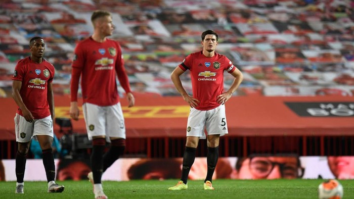 MANCHESTER, ENGLAND - JULY 13: Harry Maguire of Manchester United looks dejected during the Premier League match between Manchester United and Southampton FC at Old Trafford on July 13, 2020 in Manchester, England. Football Stadiums around Europe remain empty due to the Coronavirus Pandemic as Government social distancing laws prohibit fans inside venues resulting in all fixtures being played behind closed doors. (Photo by Peter Powell/Pool via Getty Images)