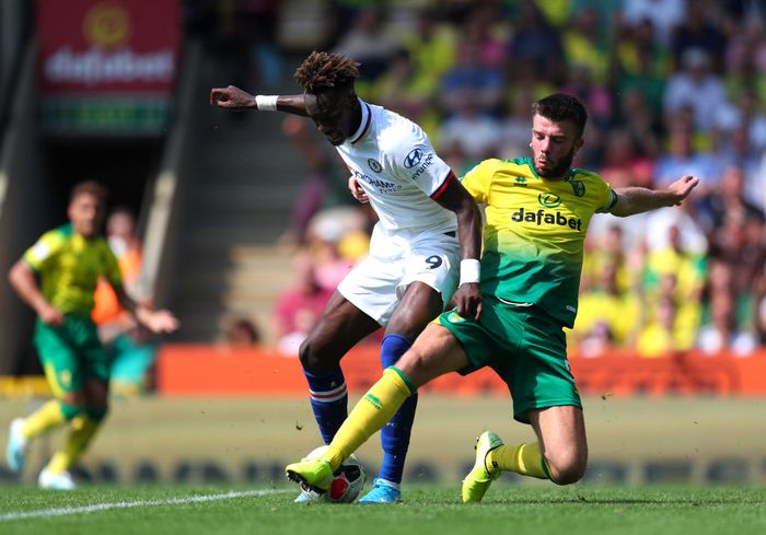 Norwich vs Chelsea NORWICH, ENGLAND - AUGUST 24: Grant Hanley of Norwich City battles for possession with Tammy Abraham of Chelsea during the Premier League match between Norwich City and Chelsea FC at Carrow Road on August 24, 2019 in Norwich, United Kingdom. (Photo by Catherine Ivill/Getty Images)