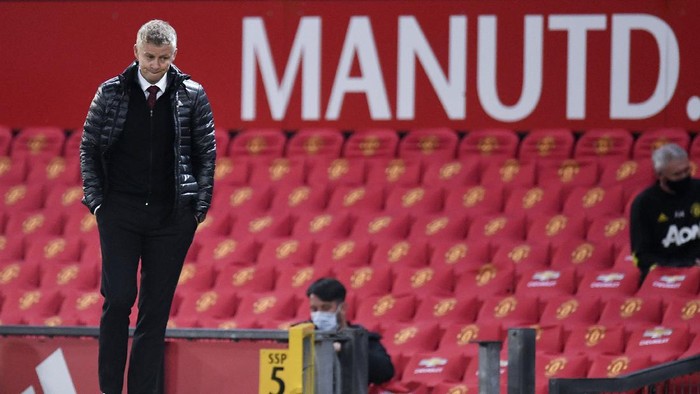 Manchester Uniteds manager Ole Gunnar Solskjaer reacts after the English Premier League soccer match between Manchester United and Southampton at Old Trafford in Manchester, England, Monday, July 13, 2020. (AP Photo/Peter Powell,Pool)