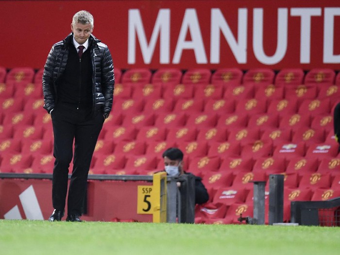Manchester Uniteds manager Ole Gunnar Solskjaer reacts after the English Premier League soccer match between Manchester United and Southampton at Old Trafford in Manchester, England, Monday, July 13, 2020. (AP Photo/Peter Powell,Pool)
