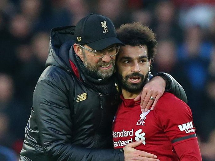 LIVERPOOL, ENGLAND - FEBRUARY 09: Jurgen Klopp, Manager of Liverpool celebrates victory with Mohamed Salah of Liverpool after the Premier League match between Liverpool FC and AFC Bournemouth at Anfield on February 9, 2019 in Liverpool, United Kingdom.  (Photo by Alex Livesey/Getty Images)