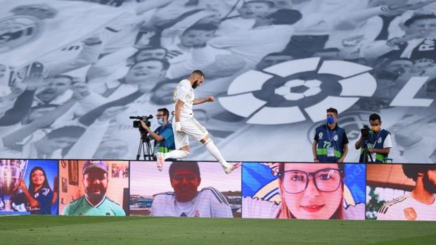MADRID, SPAIN - JULY 16: Karim Benzema of Madrid celebrates scoring the first goal during the Liga match between Real Madrid CF and Villarreal CF at Estadio Alfredo Di Stefano on July 16, 2020 in Madrid, Spain. (Photo by Denis Doyle/Getty Images)