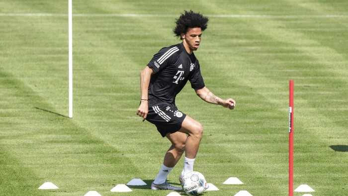 Leroy Sane, new player of the German first division, Bundesliga, soccer team FC Bayern Munich, takes part in a training session in Munich, Germany, Tuesday, July 14, 2020. (Matthias Balk/dpa via AP)