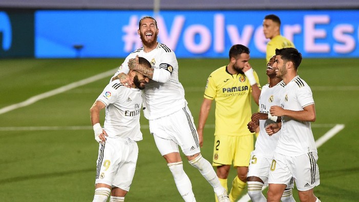MADRID, SPAIN - JULY 16: Karim Benzema of Madrid celebrates scoring the second goal from a penalty during the Liga match between Real Madrid CF and Villarreal CF at Estadio Alfredo Di Stefano on July 16, 2020 in Madrid, Spain. (Photo by Denis Doyle/Getty Images)