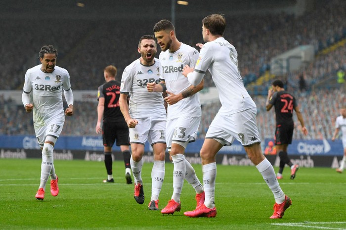 1255233719 LEEDS, ENGLAND - JULY 09: Mateusz Klich of Leeds United celebrates with his team mates after scoring his team's first goal during the Sky Bet Championship match between Leeds United and Stoke City at Elland Road on July 09, 2020 in Leeds, England. Football Stadiums around Europe remain empty due to the Coronavirus Pandemic as Government social distancing laws prohibit fans inside venues resulting in all fixtures being played behind closed doors. (Photo by George Wood/Getty Images)