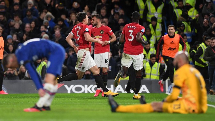 LONDON, ENGLAND - FEBRUARY 17: Harry Maguire of Manchester United celebrates after scoring his sides second goal during the Premier League match between Chelsea FC and Manchester United at Stamford Bridge on February 17, 2020 in London, United Kingdom. (Photo by Shaun Botterill/Getty Images)