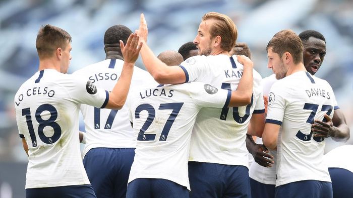 Tottenham Hotspur LONDON, ENGLAND - JULY 19: Harry Kane of Tottenham Hotspur celebrates after he scores his teams third goal during the Premier League match between Tottenham Hotspur and Leicester City at Tottenham Hotspur Stadium on July 19, 2020 in London, England. Football Stadiums around Europe remain empty due to the Coronavirus Pandemic as Government social distancing laws prohibit fans inside venues resulting in all fixtures being played behind closed doors. (Photo by Michael Regan/Getty Images)