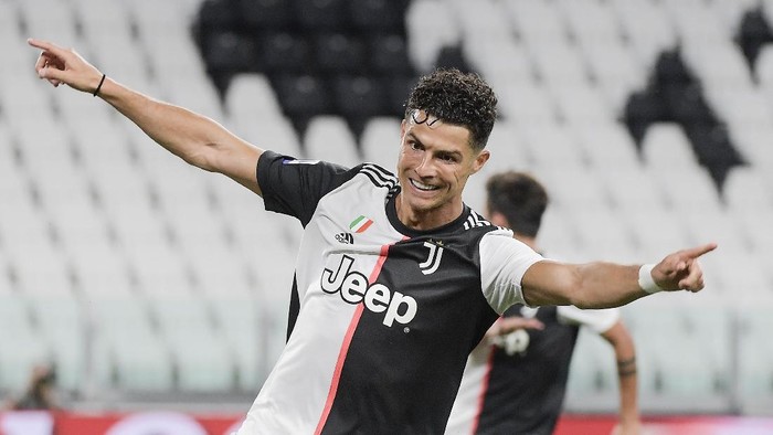 Juventus Cristiano Ronaldo celebrates after scoring during the Italian Serie A soccer match between Juventus and Lazio at the Allianz stadium in Turin, Italy, Monday, July 20, 2020. (Marco Alpozzi/LaPresse via AP)