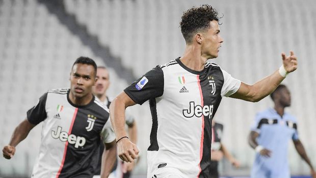 Juventus' Cristiano Ronaldo celebrates after scoring during the Italian Serie A soccer match between Juventus and Lazio at the Allianz stadium in Turin, Italy, Monday, July 20, 2020. (Marco Alpozzi/LaPresse via AP)