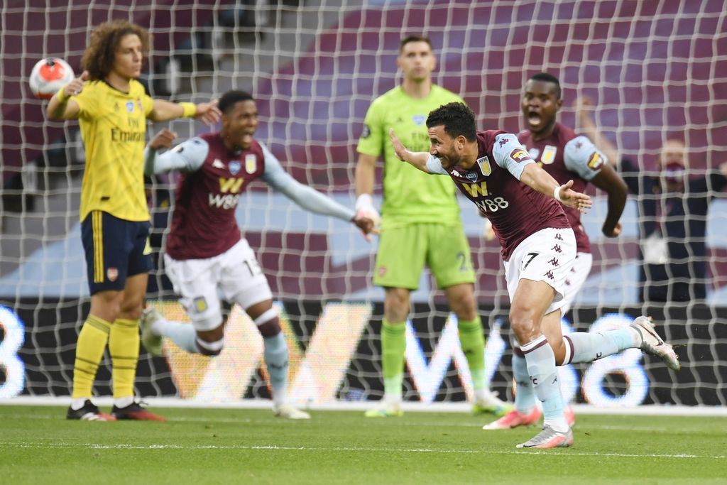 BIRMINGHAM, ENGLAND - JULY 21: Trezeguet of Aston Villa celebrates after he scores his sides 1st goal during the Premier League match between Aston Villa and Arsenal FC at Villa Park on July 21, 2020 in Birmingham, England. Football Stadiums around Europe remain empty due to the Coronavirus Pandemic as Government social distancing laws prohibit fans inside venues resulting in all fixtures being played behind closed doors. (Photo by Peter Powell/Pool via Getty Images)