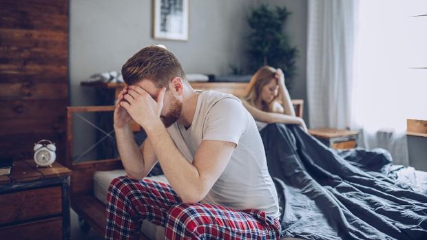 Elderly man sadly bowed head, feeling lonely and depressed, old age crisis