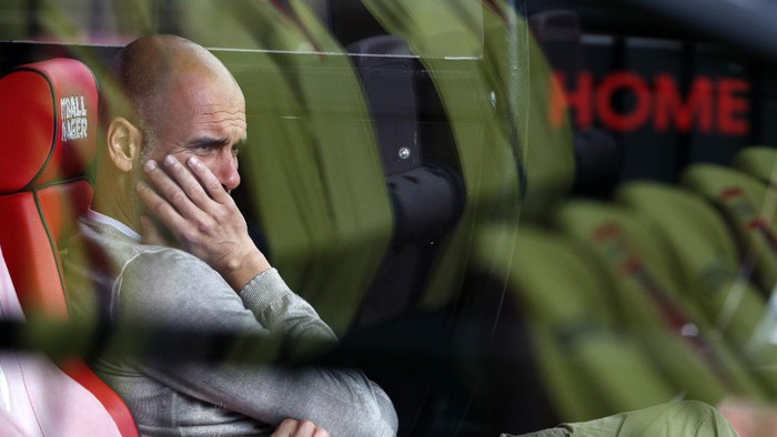 WATFORD, ENGLAND - JULY 21: Pep Guardiola, Manager of Manchester City looks on prior to the Premier League match between Watford FC and Manchester City at Vicarage Road on July 21, 2020 in Watford, England. Football Stadiums around Europe remain empty due to the Coronavirus Pandemic as Government social distancing laws prohibit fans inside venues resulting in all fixtures being played behind closed doors. (Photo by Adrian Dennis/Pool via Getty Images)