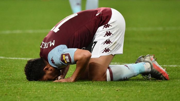 Trezeguet BIRMINGHAM, ENGLAND - JULY 21: Trezeguet of Aston Villa kisses the pitch after the Premier League match between Aston Villa and Arsenal FC at Villa Park on July 21, 2020 in Birmingham, England. Football Stadiums around Europe remain empty due to the Coronavirus Pandemic as Government social distancing laws prohibit fans inside venues resulting in all fixtures being played behind closed doors. (Photo by Rui Vieira/Pool via Getty Images)