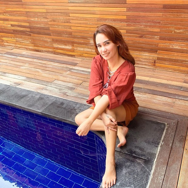 Feby Febiola/instagram.com/febyfebiola_/ Penampilan Feby Febiola dengan rambut panjang sebelum divonis kanker