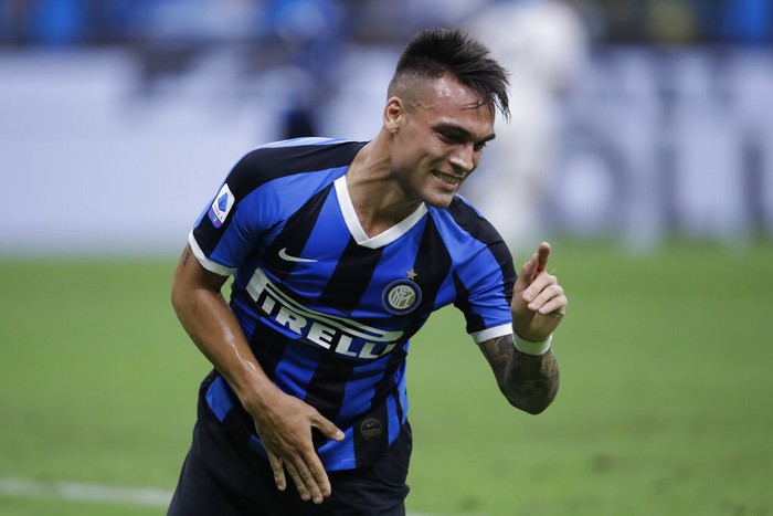 Inter Milans Lautaro Martinez gestures during a Serie A soccer match between Inter Milan and Fiorentina, at the San Siro stadium in Milan, Italy, Wednesday, July 22, 2020. (AP Photo/Luca Bruno)