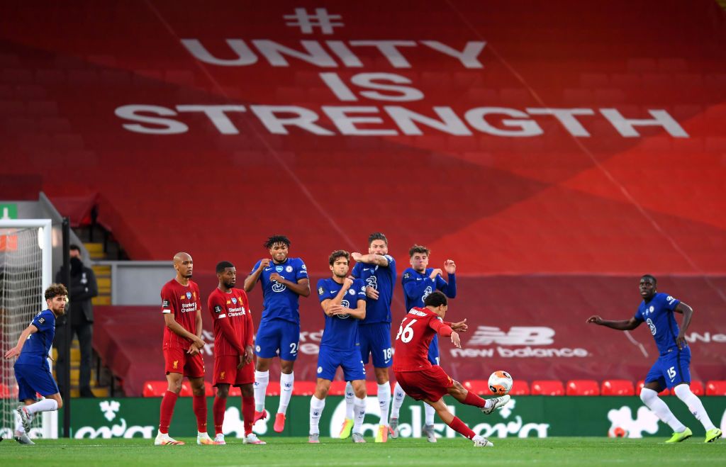 LIVERPOOL, ENGLAND - JULY 22: Trent Alexander-Arnold of Liverpool scores his team's second goal from a free kick during the Premier League match between Liverpool FC and Chelsea FC at Anfield on July 22, 2020 in Liverpool, England. Football Stadiums around Europe remain empty due to the Coronavirus Pandemic as Government social distancing laws prohibit fans inside venues resulting in all fixtures being played behind closed doors. (Photo by Laurence Griffiths/Getty Images)