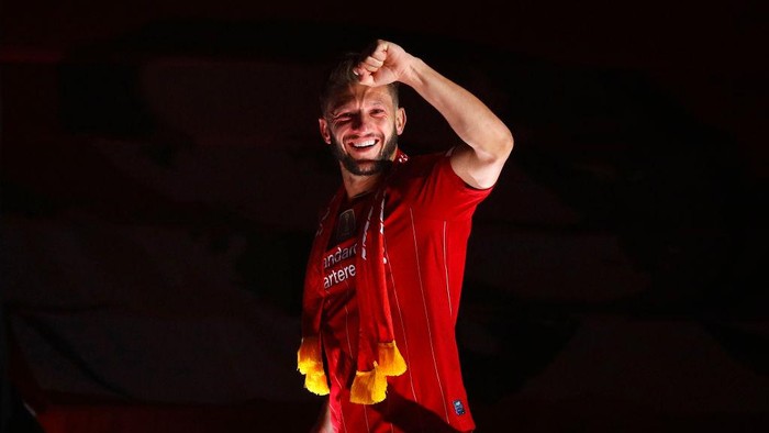 LIVERPOOL, ENGLAND - JULY 22: Adam Lallana of Liverpool celebrates following the Premier League match between Liverpool FC and Chelsea FC at Anfield on July 22, 2020 in Liverpool, England. Football Stadiums around Europe remain empty due to the Coronavirus Pandemic as Government social distancing laws prohibit fans inside venues resulting in all fixtures being played behind closed doors. (Photo by Phil Noble/Pool via Getty Images)
