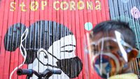 Corona di RI Tembus 100 Ribu