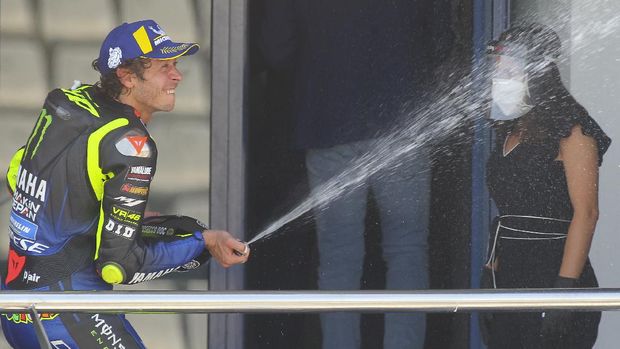 MotoGP Yamaha rider Valentino Rossi of Italy celebrates 3rd place during the Andalucia Motorcycle Grand Prix at the Angel Nieto racetrack in Jerez de la Frontera, Spain, Sunday July 26, 2020. (AP Photo/David Clares)