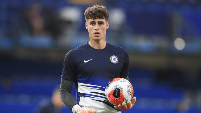 Chelseas goalkeeper Kepa Arrizabalaga warms up ahead of the English Premier League soccer match between Chelsea and Norwich City at Stamford Bridge in London, England, Tuesday, July 14, 2020. (AP Photo/Adam Davy,Pool)
