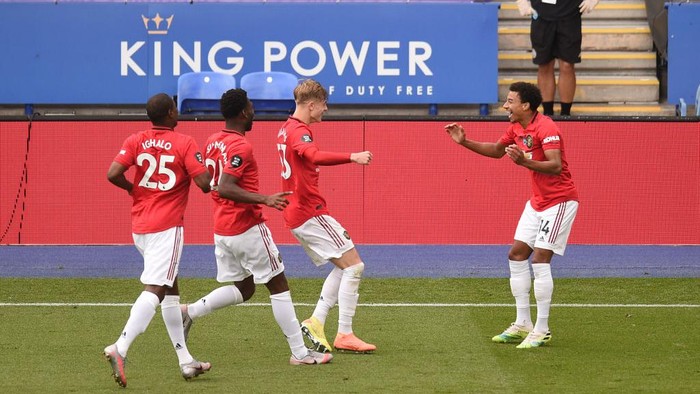LEICESTER, ENGLAND - JULY 26: Jesse Lingard of Manchester United celebrates scoring his sides second goal during the Premier League match between Leicester City and Manchester United at The King Power Stadium on July 26, 2020 in Leicester, England.Football Stadiums around Europe remain empty due to the Coronavirus Pandemic as Government social distancing laws prohibit fans inside venues resulting in all fixtures being played behind closed doors. (Photo by Oli Scarff/Pool via Getty Images)