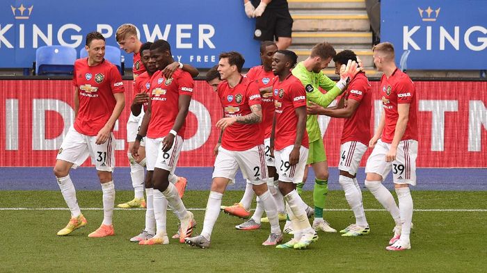 Manchester United LEICESTER, ENGLAND - JULY 26: Jesse Lingard of Manchester United celebrates scoring his sides second goal during the Premier League match between Leicester City and Manchester United at The King Power Stadium on July 26, 2020 in Leicester, England.Football Stadiums around Europe remain empty due to the Coronavirus Pandemic as Government social distancing laws prohibit fans inside venues resulting in all fixtures being played behind closed doors. (Photo by Oli Scarff/Pool via Getty Images)