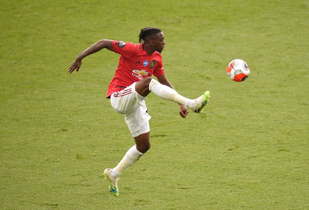 LEICESTER, ENGLAND - JULY 26: Aaron Wan-Bissaka of Manchester United controls the ball during the Premier League match between Leicester City and Manchester United at The King Power Stadium on July 26, 2020 in Leicester, England.Football Stadiums around Europe remain empty due to the Coronavirus Pandemic as Government social distancing laws prohibit fans inside venues resulting in all fixtures being played behind closed doors. (Photo by Oli Scarff/Pool via Getty Images)