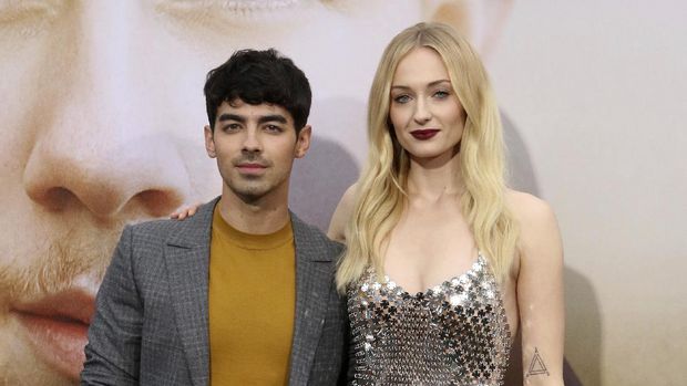 FILE - Joe Jonas, left, and Sophie Turner attend the World Premiere of 