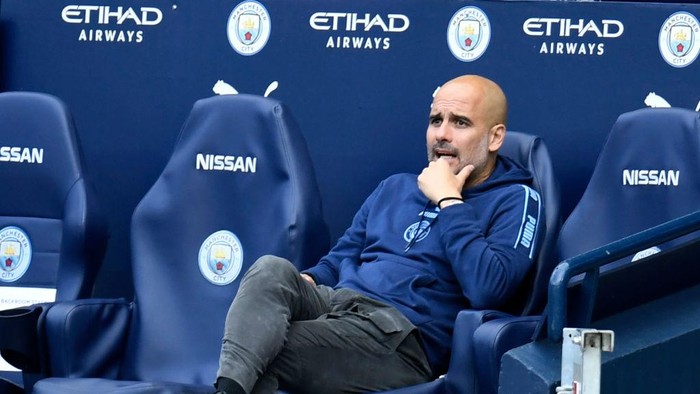 MANCHESTER, ENGLAND - JULY 26: Pep Guardiola, Manager of Manchester City looks on from the touchline during the Premier League match between Manchester City and Norwich City at Etihad Stadium on July 26, 2020 in Manchester, England.Football Stadiums around Europe remain empty due to the Coronavirus Pandemic as Government social distancing laws prohibit fans inside venues resulting in all fixtures being played behind closed doors. (Photo by Peter Powell/Pool via Getty Images)