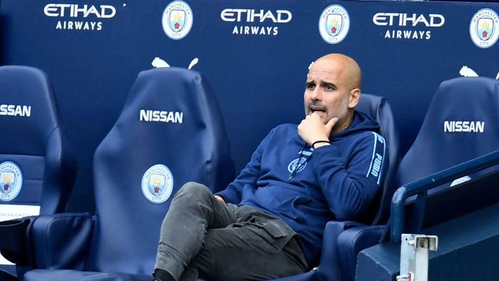 Pep Guardiola MANCHESTER, ENGLAND - JULY 26: Pep Guardiola, Manager of Manchester City looks on from the touchline during the Premier League match between Manchester City and Norwich City at Etihad Stadium on July 26, 2020 in Manchester, England.Football Stadiums around Europe remain empty due to the Coronavirus Pandemic as Government social distancing laws prohibit fans inside venues resulting in all fixtures being played behind closed doors. (Photo by Peter Powell/Pool via Getty Images)