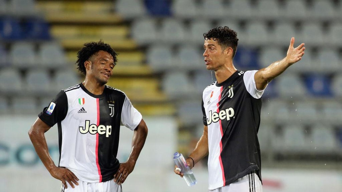 Cuadrado dan Ronaldo semasa bermain bersama di Juventus. Foto: Getty Images/Enrico Locci