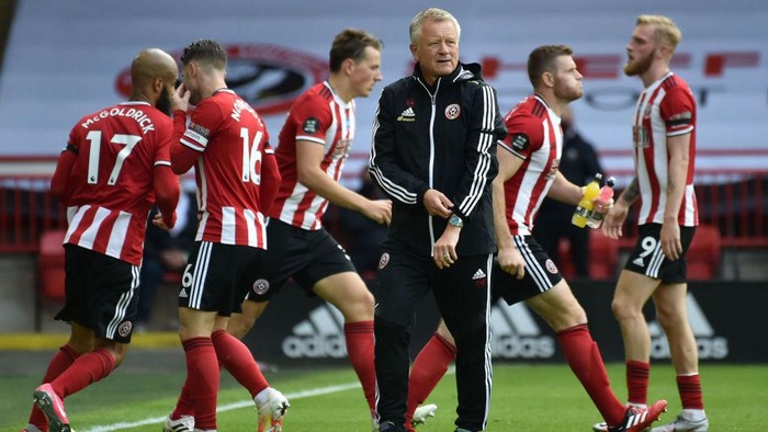 SHEFFIELD, ENGLAND - JULY 11: Chris Wilder, Manager of Sheffield United looks on ahead of the second half in the Premier League match between Sheffield United and Chelsea FC at Bramall Lane on July 11, 2020 in Sheffield, England. Football Stadiums around Europe remain empty due to the Coronavirus Pandemic as Government social distancing laws prohibit fans inside venues resulting in all fixtures being played behind closed doors. (Photo by Rui Vieira/Pool via Getty Images)
