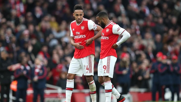 LONDON, ENGLAND - MARCH 07: Pierre-Emerick Aubameyang and Alexandre Lacazette of Arsenal talk following their sides victory in the Premier League match between Arsenal FC and West Ham United at Emirates Stadium on March 07, 2020 in London, United Kingdom. (Photo by Alex Morton/Getty Images)